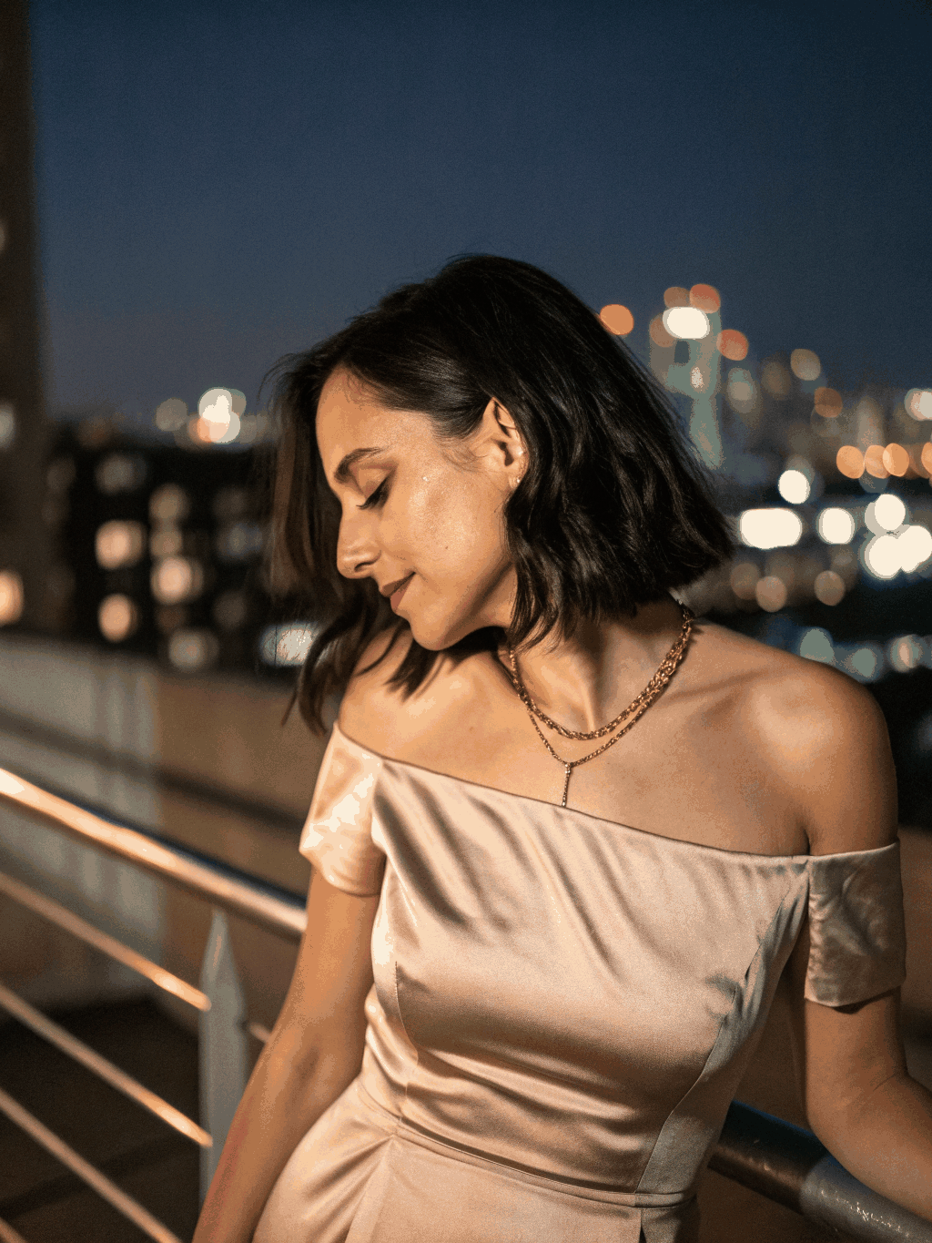 Elena Rostova wearing Electric Punch Satin Midi